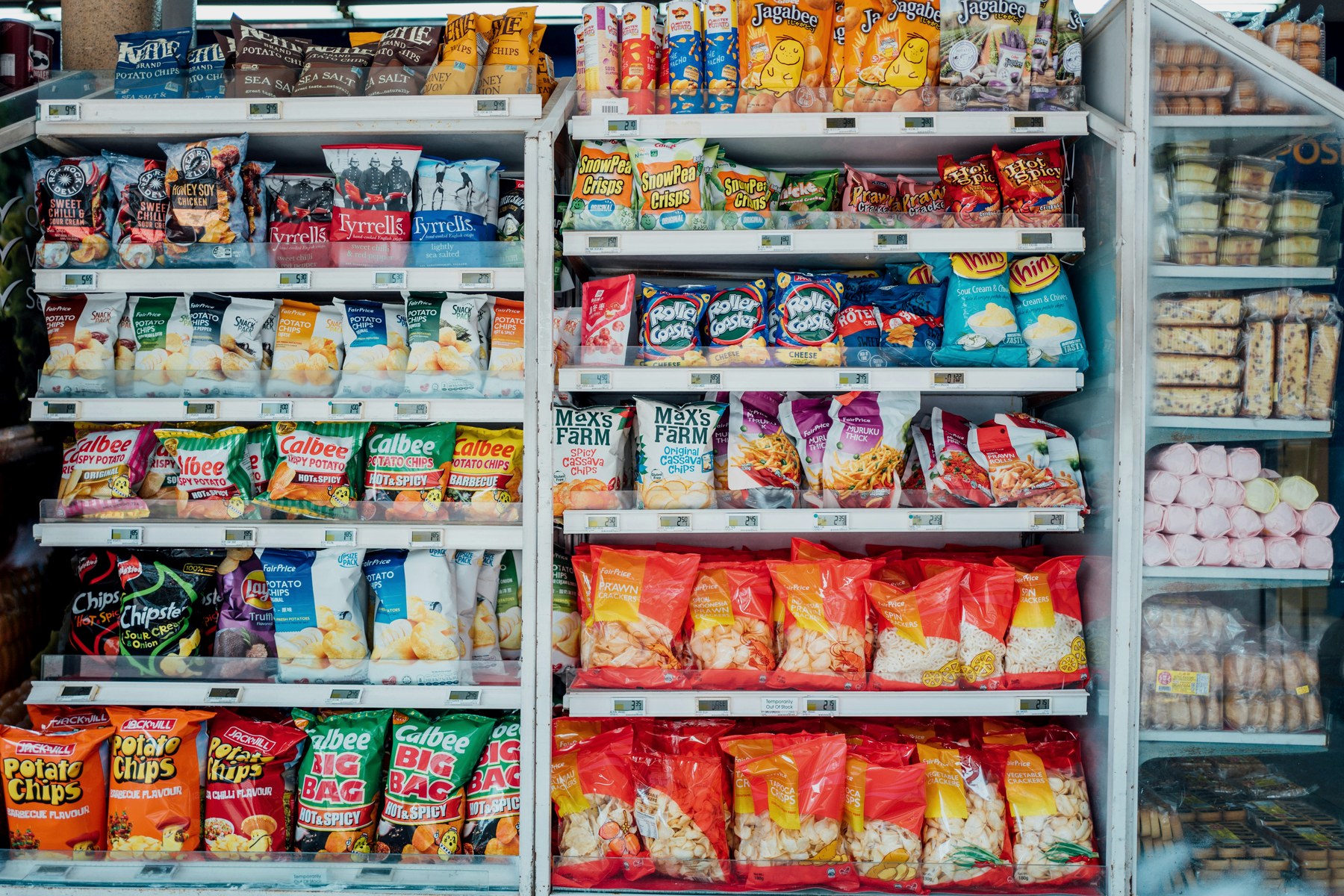 Curated gourmet grocery display in a premium specialty market